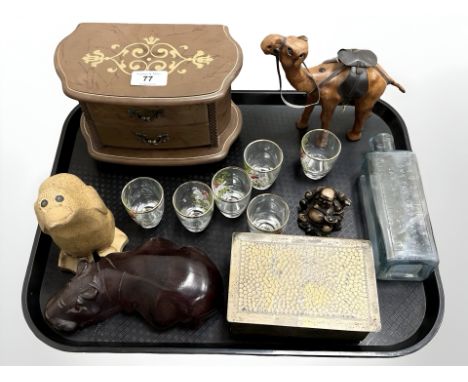 A group of collectables including leather camel figure, wooden carved Hippo, antique glass bottle, hunting glasses etc 