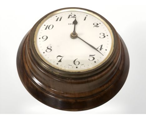 A walnut case Zenith circular eighteen day wall timepiece, diameter 21 cm.