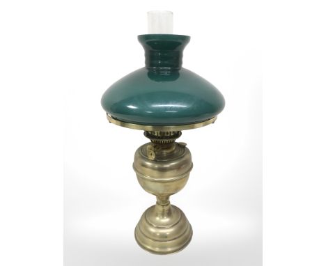 A brass Duplex oil lamp with green glass shade, height 52 cm