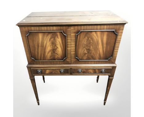 A reproduction mahogany drinks cabinet, 90 cm x 46 cm x 110 cm 