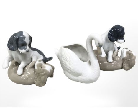 A Nao swan dish and two Nao figure groups of puppies playing, height 14 cm