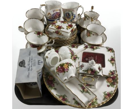 Approximately twenty eight pieces of Royal Albert Old Country Roses porcelain including tea cups, saucers, wall time piece, p