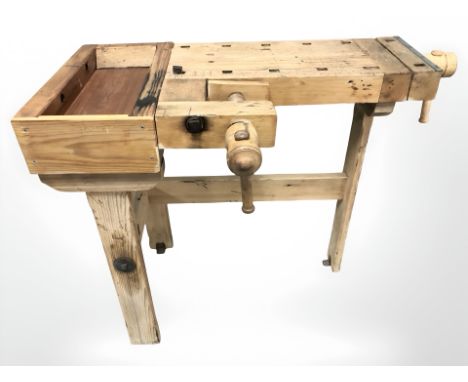 A small vintage pine work bench fitted with two vice, 100 cm x 58 cm x 77 cm 