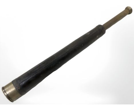 A 19th century brass and leather telescope 