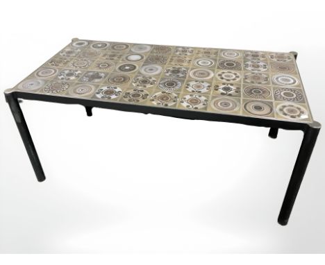 An enameled metal and tile inset coffee table, 125 cm x 63 cm x 55 cm 