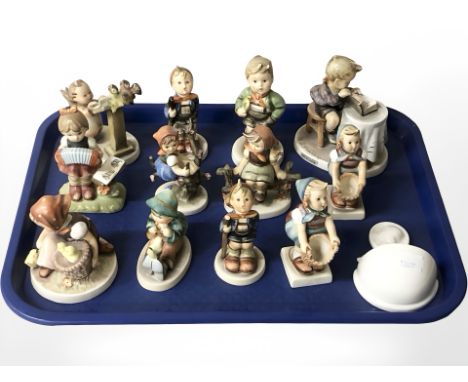 A group of Goebel figures of boys and girls, Hummel wall pocket 