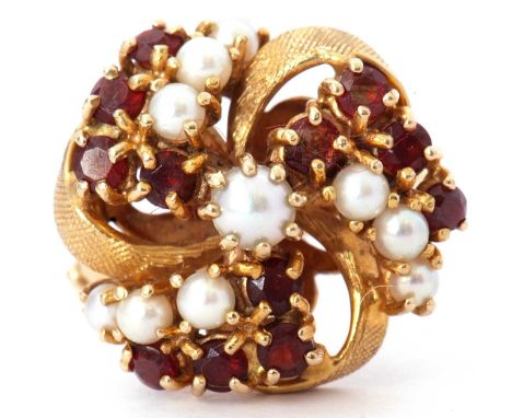 9ct gold seed pearl and garnet cluster ring, a circular tied ribbon design decorated with ten graduated seed pearls and 12 sm