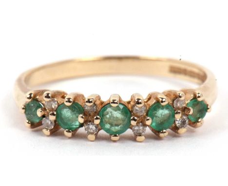 9ct gold emerald and diamond half eternity ring set with five small graduated round cut emeralds highlighted between with sma