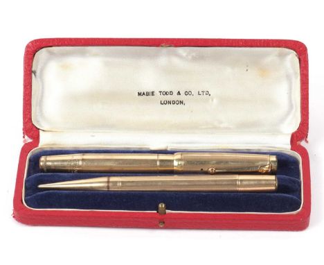 Mixed Lot: A swan pen Mabie Todd &amp; Co Ltd, engine turned engraved, screw on lid with a 14ct swan Mabie Todd nib together 