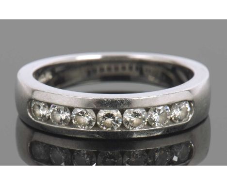 'Hearts on Fire' platinum diamond half eternity ring, chanel set with seven round brilliant cut diamonds, stamped 'HOF', size