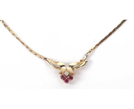 A modern 9ct gold ruby and diamond necklace, 21cm fastened, g/w 4..4 gms