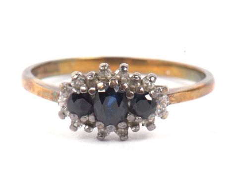 9ct gold sapphire and diamond ring featuring three dark graduated sapphires within a small single cut diamond surround, size 