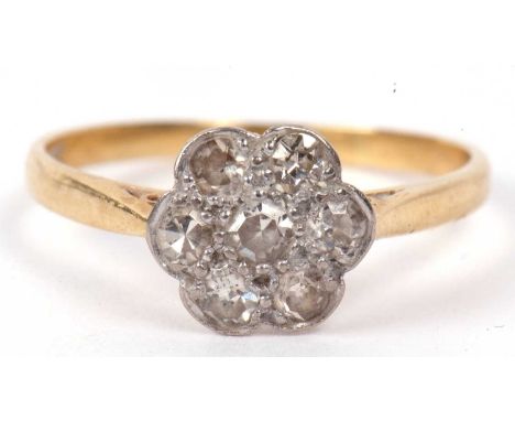 Antique diamond cluster ring, a flower head design featuring seven small single cut diamonds, total ct weight approx 0.40ct, 