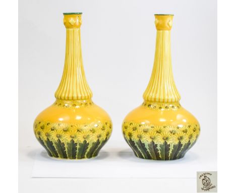 George Jones Crescent Ware Pair of 'Pompeian' Vases, of Oriental flask shape, the bulbous bodies decorated with rows of styli