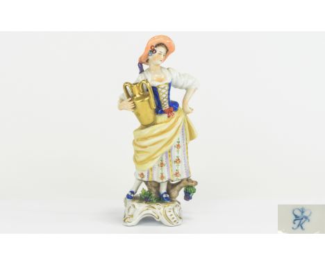 Rudolf Kammer Figure of a Woman, carrying a gilt amphora, it's contents suggested by the grape and vine leaf decoration at he