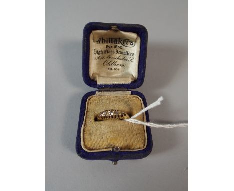 An 18 Carat Gold Ladies Ring with Five Diamonds. 