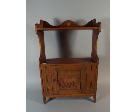 A Wall Hanging Hall Shelf Cupboard with Fret Work Dog Decoration.