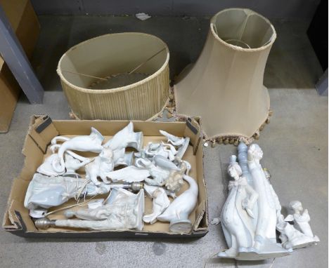 A collection of Nao figures, a Lladro lamp and one other lamp **PLEASE NOTE THIS LOT IS NOT ELIGIBLE FOR POSTING AND PACKING*