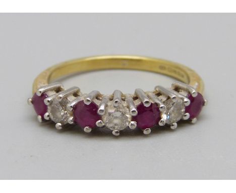 An 18ct gold ring set with rubies and diamonds, 2.7g, L 