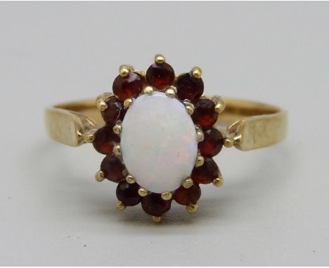 A 9ct gold, opal and garnet cluster ring, 2.1g, P 