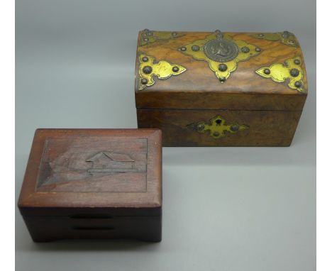 A Egyptian revival walnut tea caddy and one other wooden box 