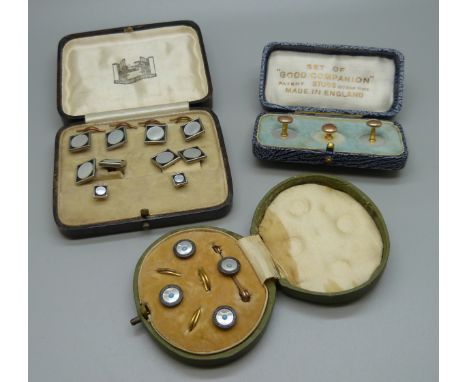 A mother of pearl Art Deco cufflink and button set, a three stud set and a button and brooch set, all cased 