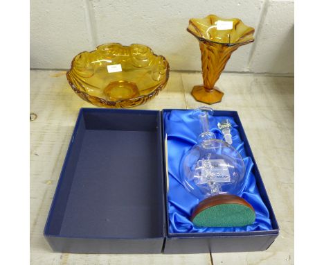 An amber coloured glass bowl and vase, and a Dunelm glass sculpture, boxed **PLEASE NOTE THIS LOT IS NOT ELIGIBLE FOR POSTING