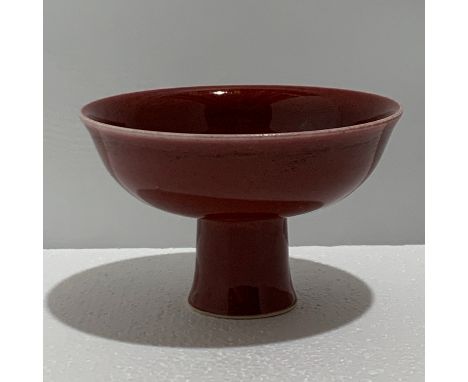 A Chinese Qing under glazed copper red stem bowl, Kangxi mark, H. 9 cm, D. 14.4 cm Provenance: Private collection British Col