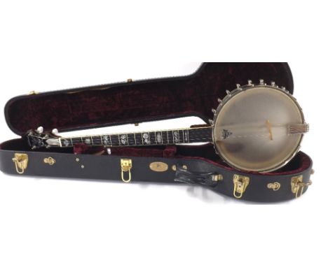Good Wildwood five string open back banjo, with tubaphone tone ring, with intricate stylised geometric mother of pearl inlay 
