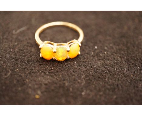 9ct Gold Ring set with orange stones possibly Opal - Size O