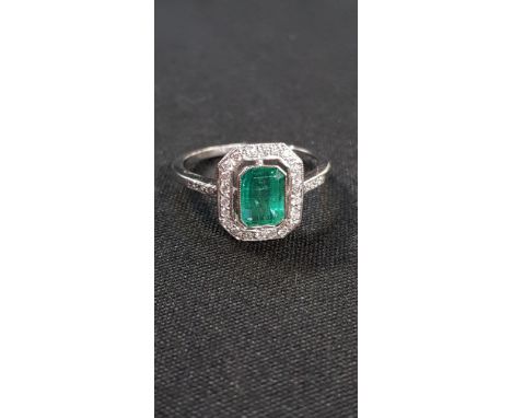 PLATINUM SET EMERALD AND DIAMOND RING