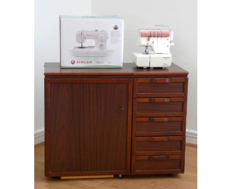 A Horn sewing cabinet, fitted interior, work surface, doubled by unfolding hinged top, W100cm, H78cm, D46cm, together with a 
