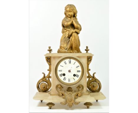 A 19th century French gilt metal and white onyx mantle clock, the white enamel dial with Roman numerals, the case with kneeli