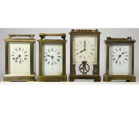 A Gibson 8 day carriage clock, movement striking to gong, together with a Schatz German 8 day carriage clock and two other un