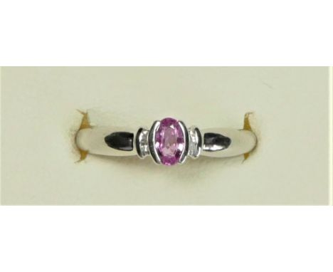 A 9ct white gold ruby and diamond ring, L, 1.5gm 