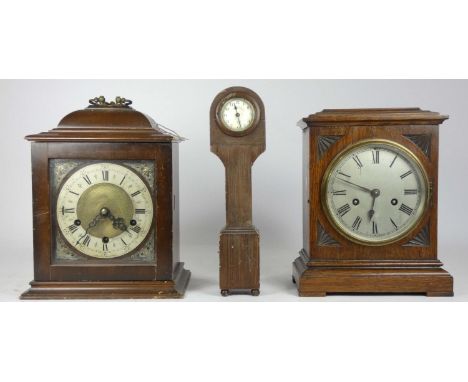 A 1950s English Westminster chime bracket clock, 30cm tall, together with an oak cased manual wind mantel clock and a miniatu