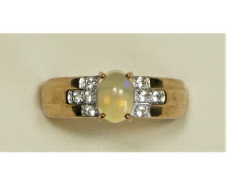 A 9ct gold opal and white sapphire dress ring, U, 3.5gm 