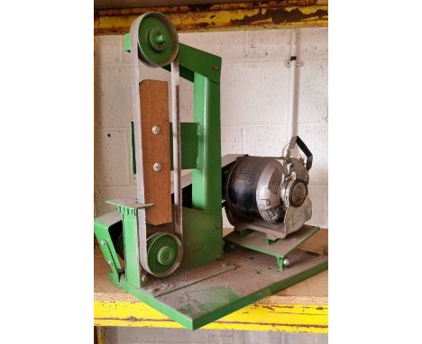 A bench mounted belt sander, 54cm high 