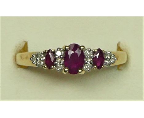 A 9ct gold ruby and diamond dress ring, ( 1/2, 1.8gm 