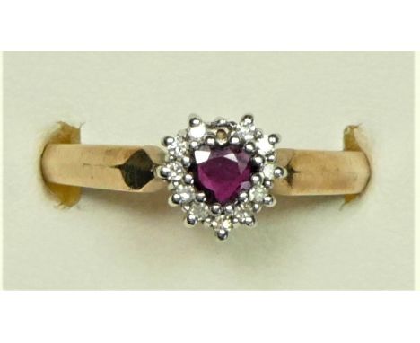 A 9ct gold ruby and diamond cluster ring, P, 3.4gm 