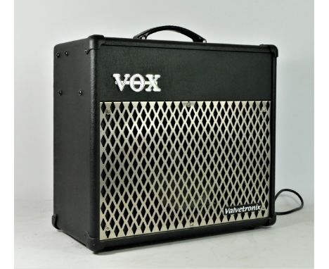 A Vox Valvetronix VT30 amp, 10" speaker, power lead and manual 