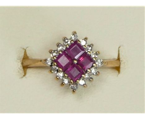 A 9ct gold ruby and diamond cluster ring, L, 2.5gm 