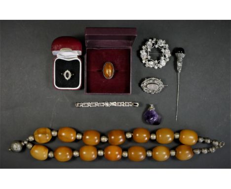 A silver baton link bracelet, a Victorian silver brooch, a silver and amber ring and other jewellery 