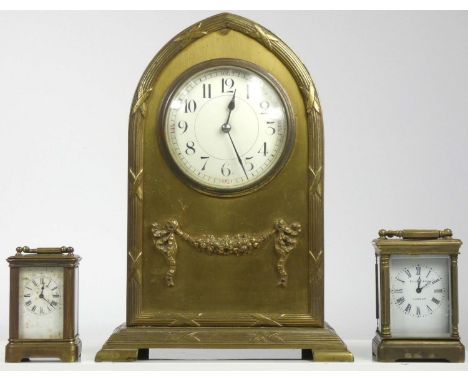 Two miniature carriage clocks, brass cased with bevel edge glass panels, white enamel dials with roman numerals, 8 day moveme