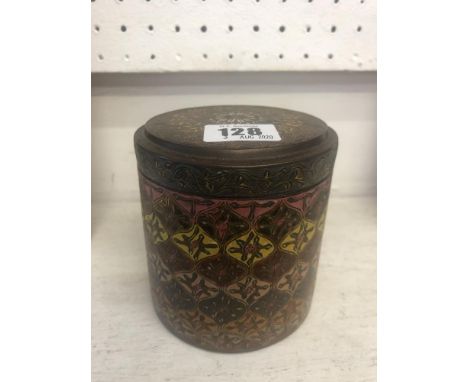 A brass and enamel early tobacco tin