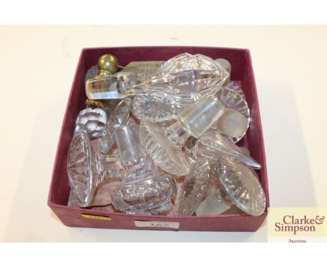 A box of antique decanter stoppers