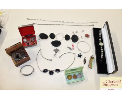 An Accurist faux pearl and gem set watch; various other white metal bangles and jewellery 