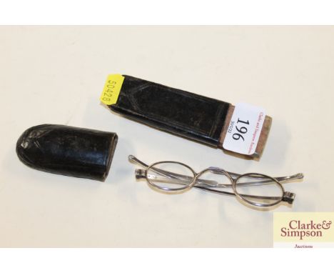 A pair of vintage cased silver spectacles