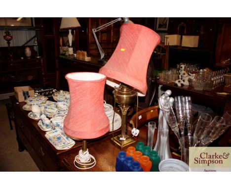 A Corinthian column oil lamp converted to electricity; and a brass table lamp and shade 