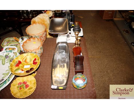 A pair of brass candlesticks; a set of kitchen scales; two model wooden chairs; a stainless steel dish; cutlery etc.